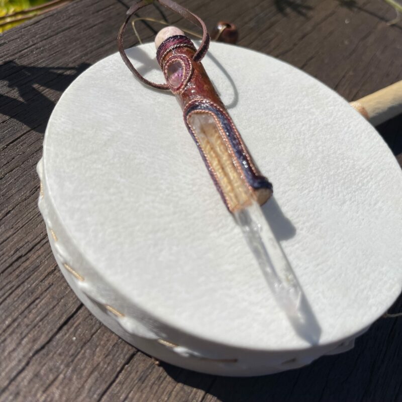 This isTalisman of Clear Empath with rohodocrosite, rose quartz, columbian lemurian blade of light quartz