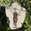 This is Talisman of Confident Deep Heart Connection with amethyst, mexican fire opal, shattuchite, brass merkabah