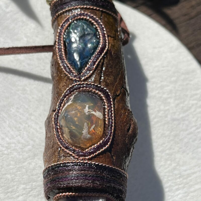 This is Talisman of Confident Deep Heart Connection with amethyst, mexican fire opal, shattuchite, brass merkabah