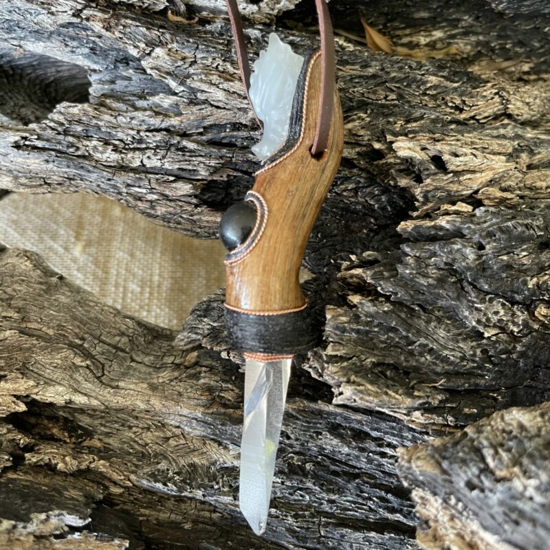 this is Talisman of Empowered Discernment with quartz dragon head, shungite sphere and columbian lemurian blade of light