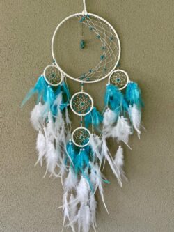 This is a Feather and beads turquoise Dreamcather