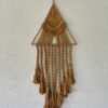 This is Brown Macrame Triangle Wall Hanging