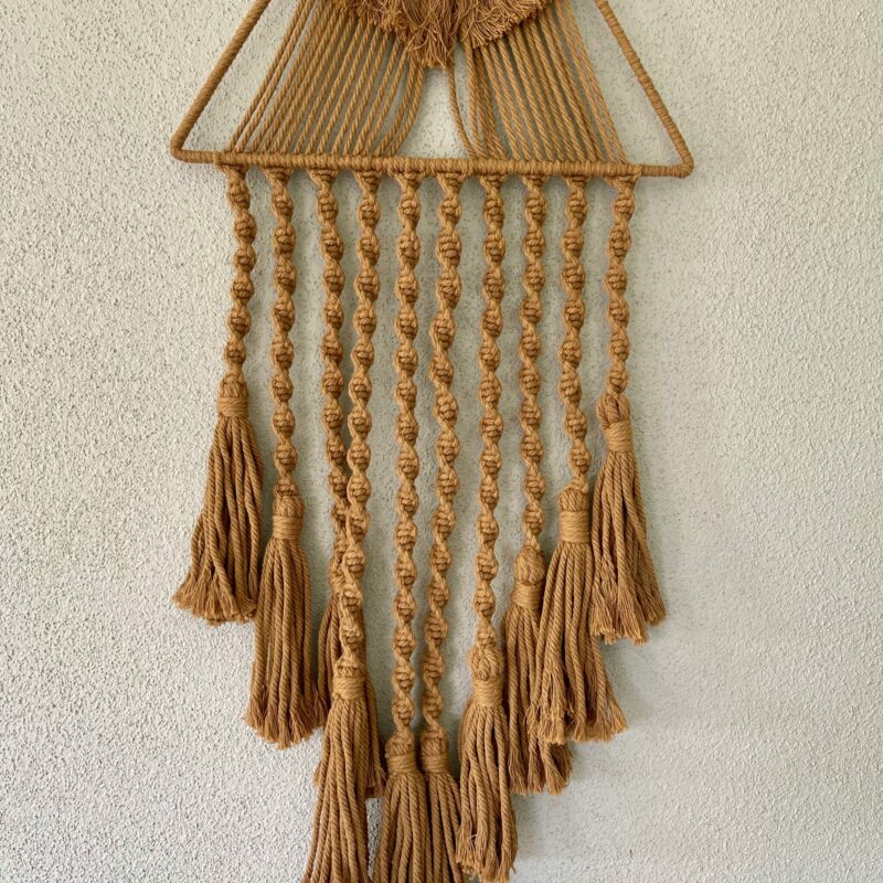 This is Brown Macrame Triangle Wall Hanging