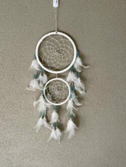 This is gorgeous white with light blue and clear beads dreamcatcher