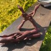 This is Hand Carved Red Wood Tripod Smudging Stand