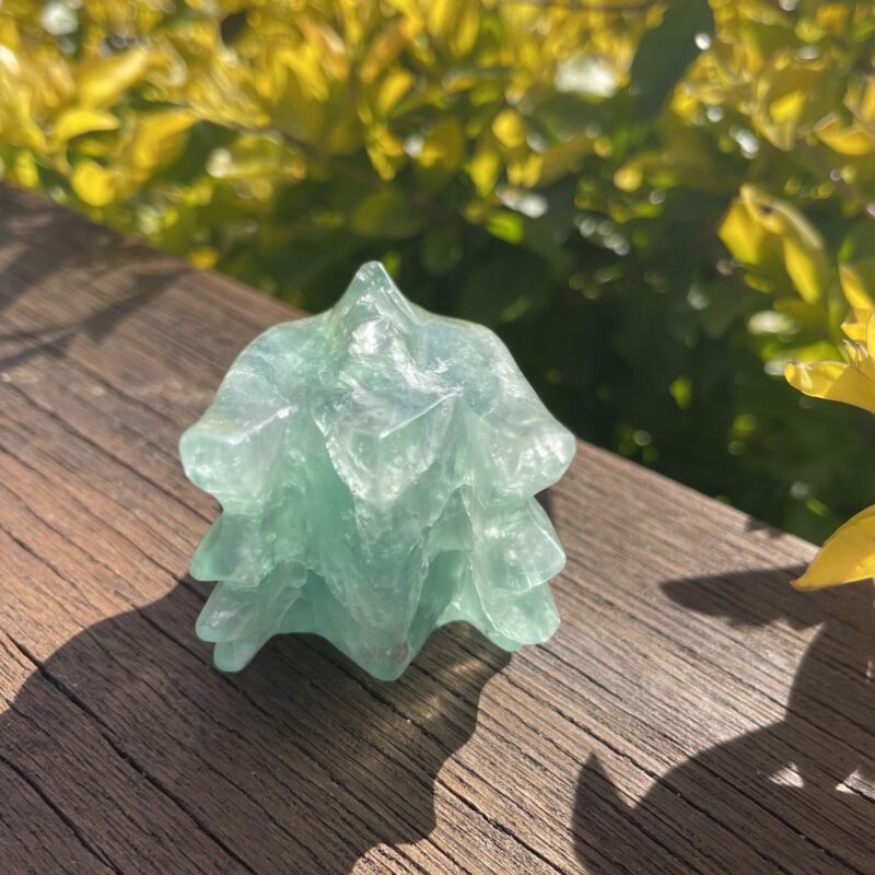 this is Rejuvenating Green Fluorite Dragon Carving