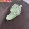 this is Rejuvenating Green Fluorite Dragon Carving