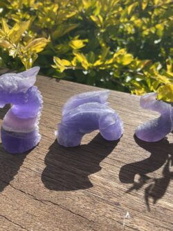 This is Mystical Loch Ness Purple Fluorite 3-Part Dragon Carving