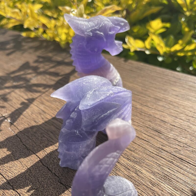 This is Mystical Loch Ness Purple Fluorite 3-Part Dragon Carving