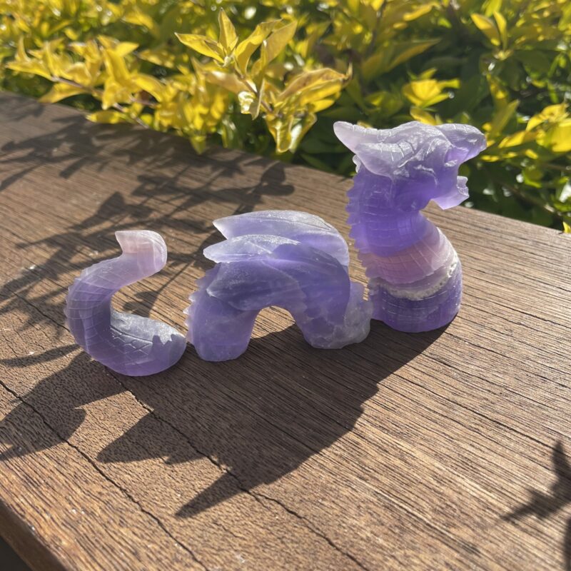 This is Mystical Loch Ness Purple Fluorite 3-Part Dragon Carving