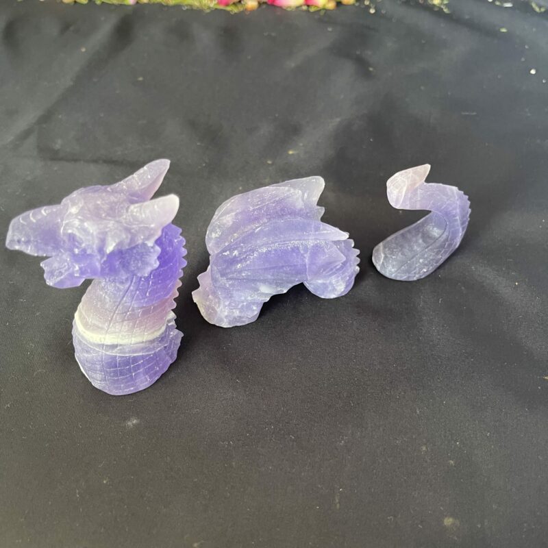 This is Mystical Loch Ness Purple Fluorite 3-Part Dragon Carving