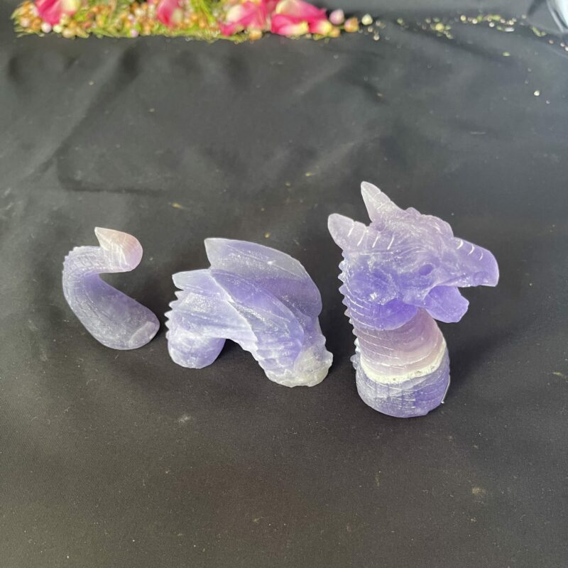 This is Mystical Loch Ness Purple Fluorite 3-Part Dragon Carving