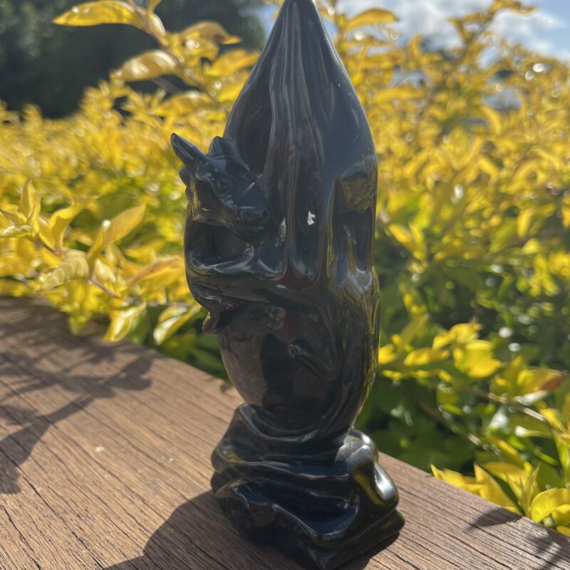 This is Black Obsidian Winged Dragon Carving