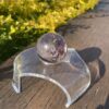 This is Mystical Clear Smoky Amethyst Sphere 5cm