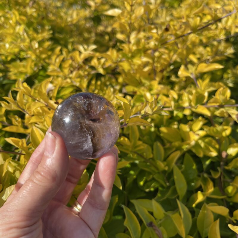 This is Mystical Clear Smoky Amethyst Sphere 5cm