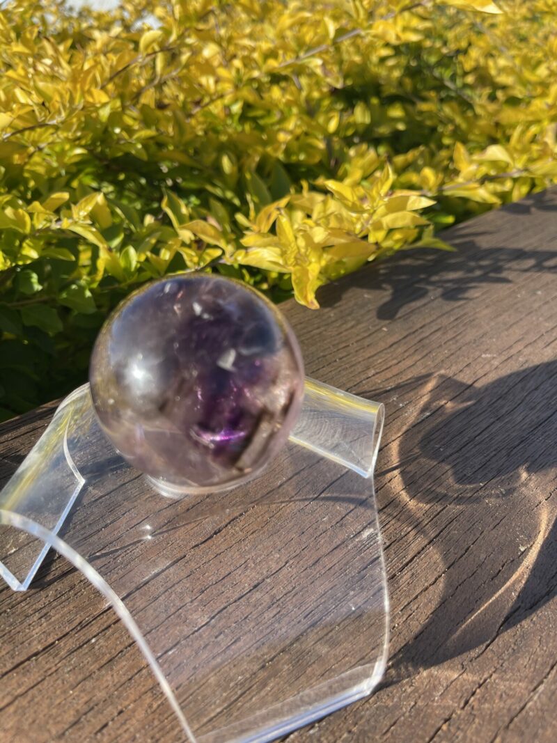 This is Enchanting Smokey Amethyst with Rainbow Medium Sphere