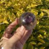 This is Enchanting Smokey Amethyst with Rainbow Medium Sphere