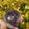 This is Enchanting Smokey Amethyst with Rainbow Medium Sphere