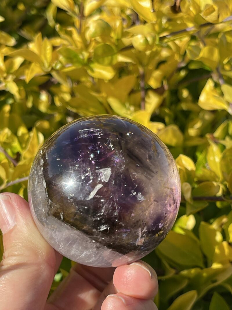 This is Enchanting Smokey Amethyst with Rainbow Medium Sphere