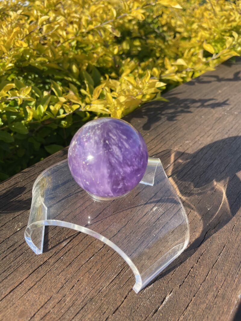 this is Happy Dark Amethyst Medium Sphere