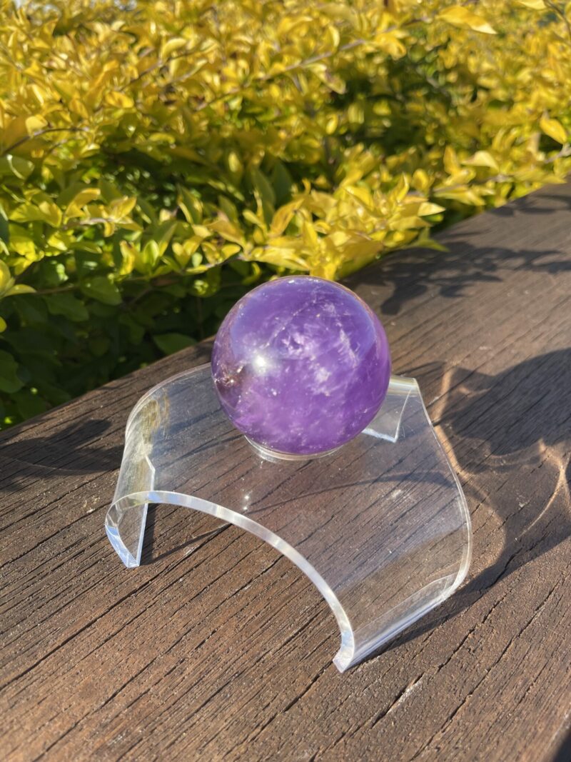 this is Happy Dark Amethyst Medium Sphere