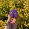 this is Happy Dark Amethyst Medium Sphere