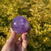 this is Happy Dark Amethyst Medium Sphere