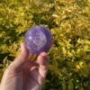 this is Happy Dark Amethyst Medium Sphere