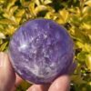 this is Happy Dark Amethyst Medium Sphere