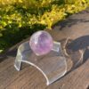 This is Rainbow Joyful Amethyst Medium Sphere