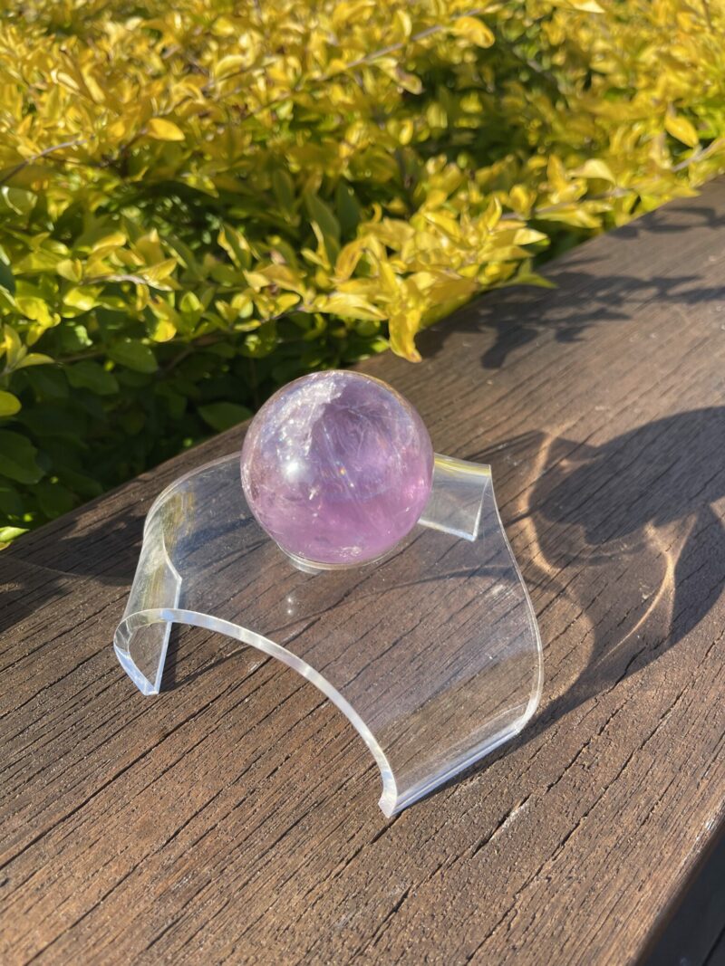 This is Rainbow Joyful Amethyst Medium Sphere