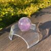 This is Rainbow Joyful Amethyst Medium Sphere