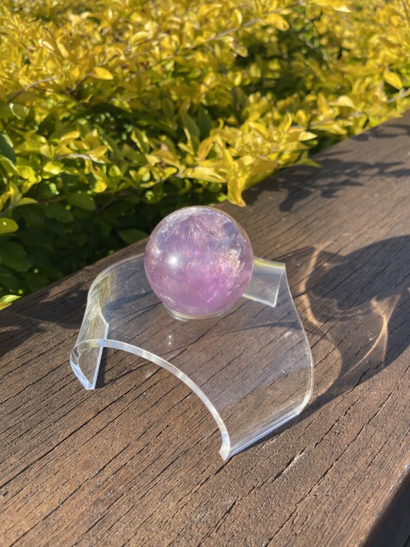 This is Rainbow Joyful Amethyst Medium Sphere