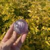 This is Rainbow Joyful Amethyst Medium Sphere