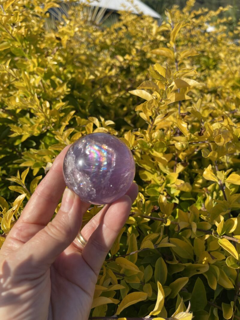 This is Rainbow Joyful Amethyst Medium Sphere