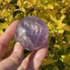 This is Rainbow Joyful Amethyst Medium Sphere