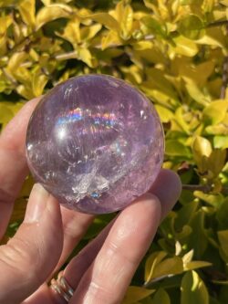 This is Rainbow Joyful Amethyst Medium Sphere