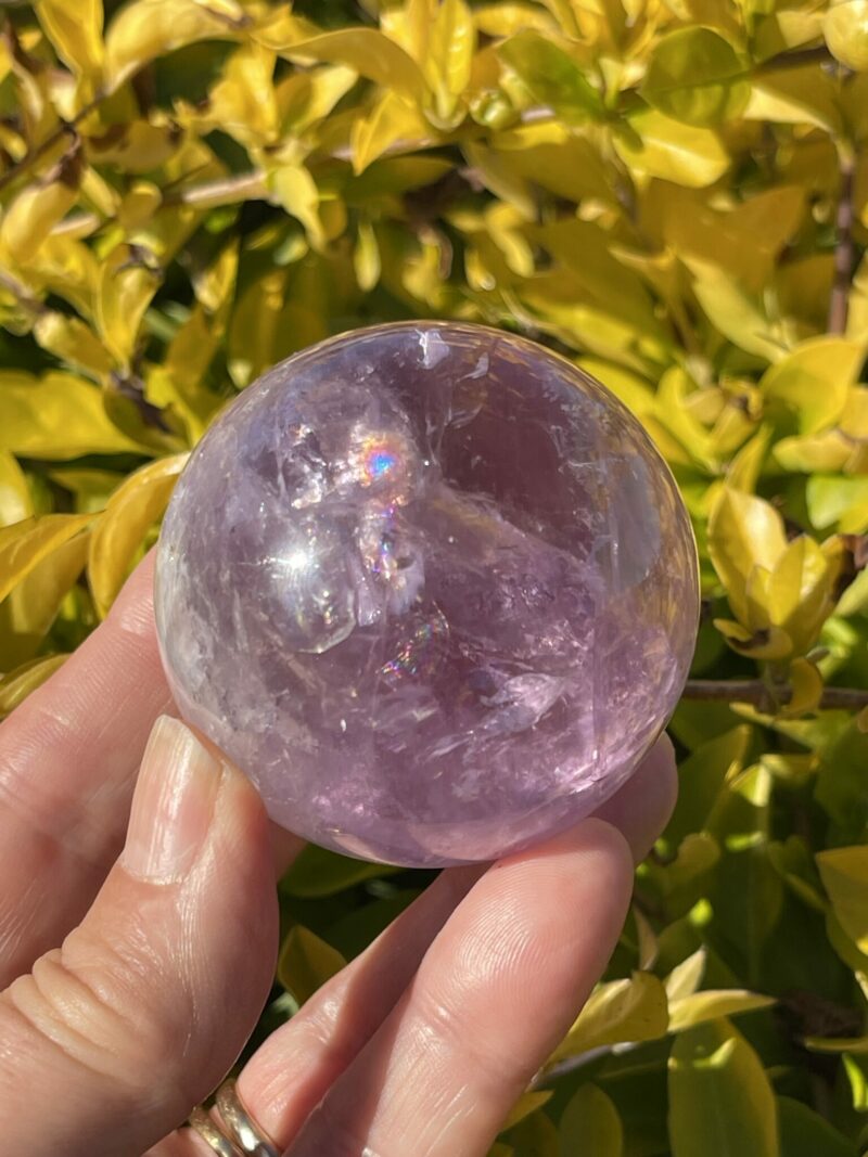 This is Rainbow Joyful Amethyst Medium Sphere