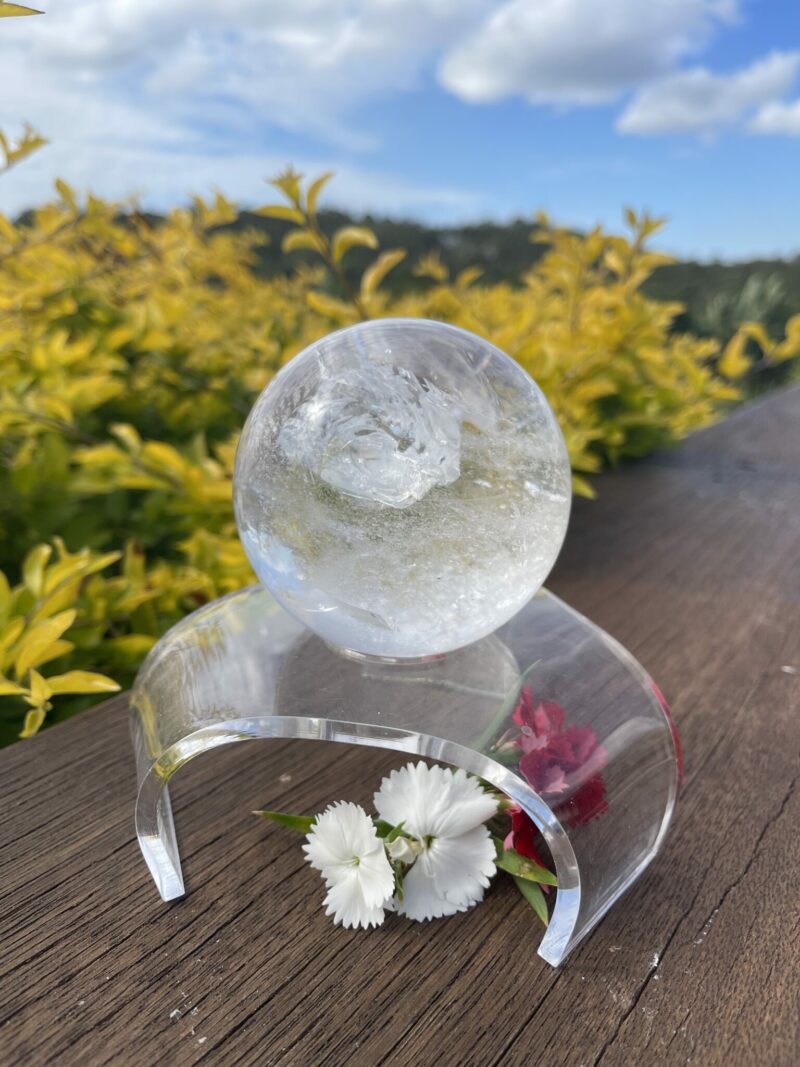 This is Dragon Figure Clear Quartz Sphere