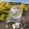 This is Dragon Figure Clear Quartz Sphere