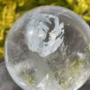 This is Dragon Figure Clear Quartz Sphere