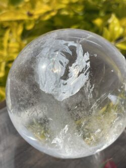 This is Dragon Figure Clear Quartz Sphere