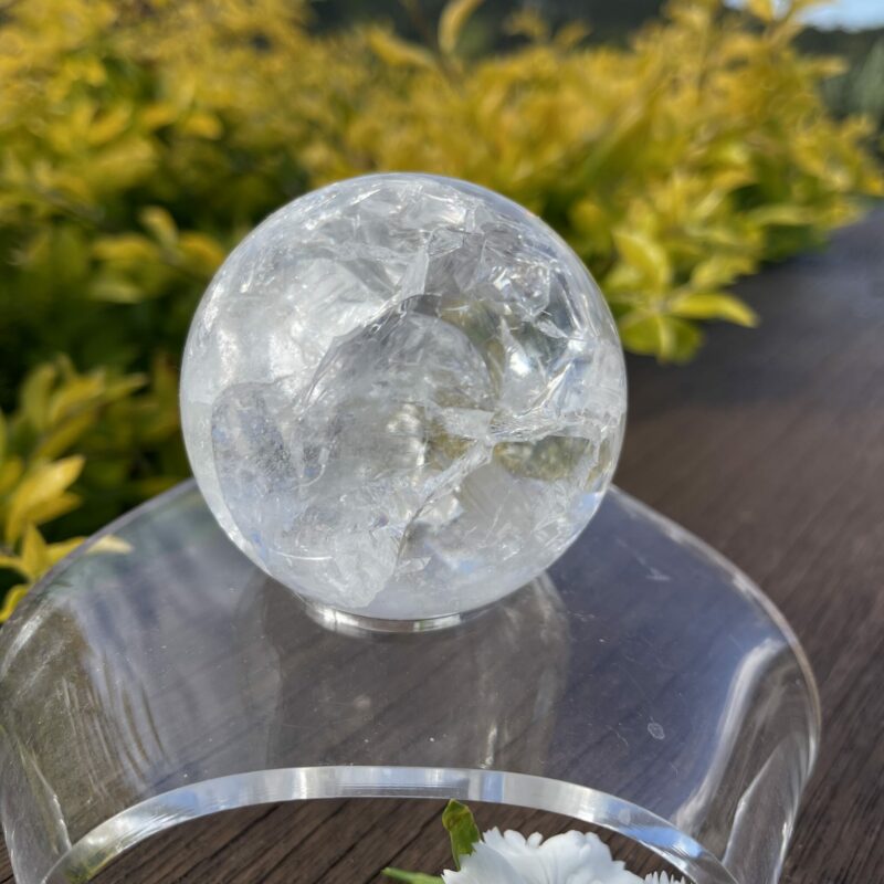 This is Stunning Rainbow Crackle Quartz Sphere