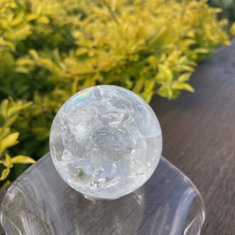 This is Stunning Rainbow Crackle Quartz Sphere