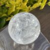 This is Stunning Rainbow Crackle Quartz Sphere