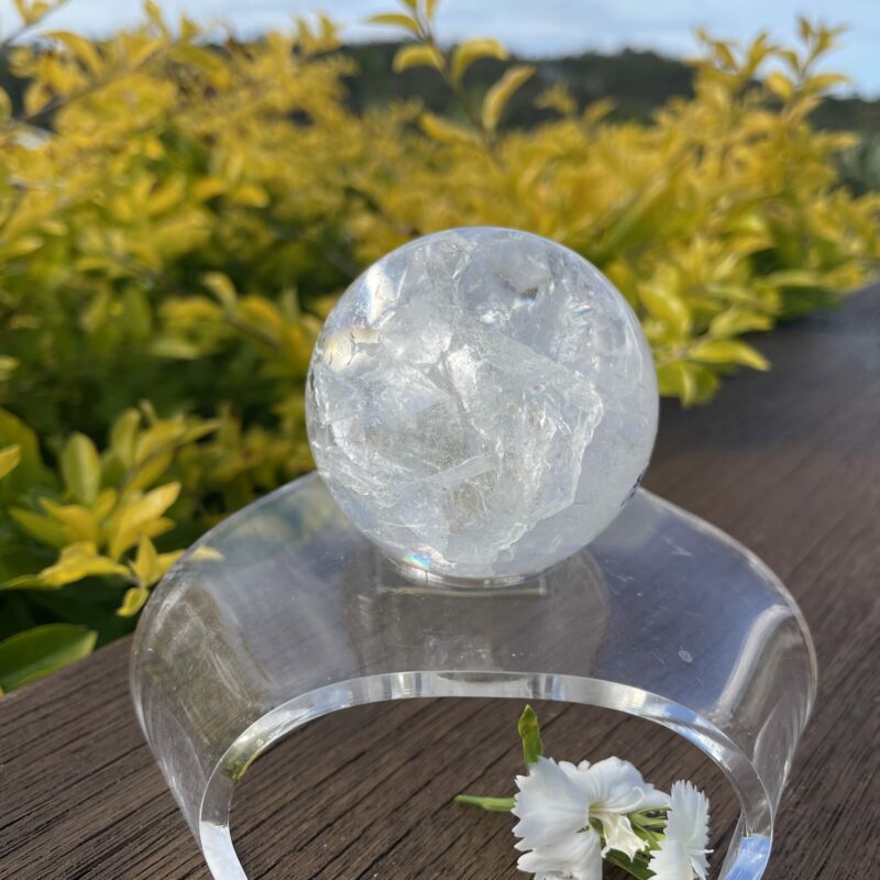 This is Stunning Rainbow Crackle Quartz Sphere