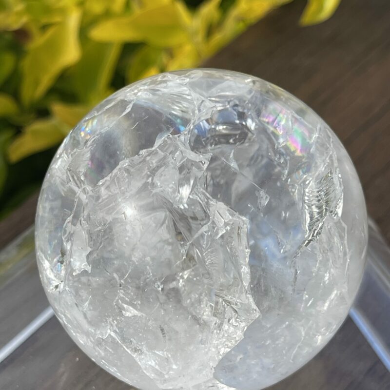 This is Stunning Rainbow Crackle Quartz Sphere