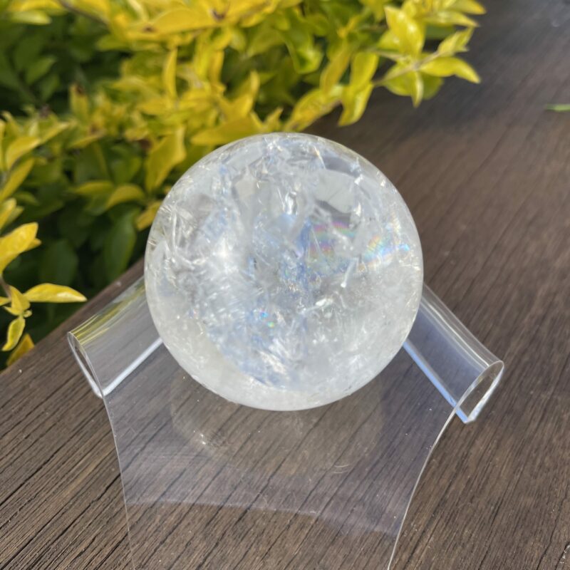 This is Stunning Rainbow Crackle Quartz Sphere