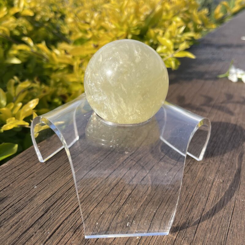 This is Sunny Golden Calcite Sphere 44mm