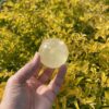 This is Sunny Golden Calcite Sphere 44mm